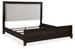 Neymorton Queen Upholstered Panel Bed with Dresser